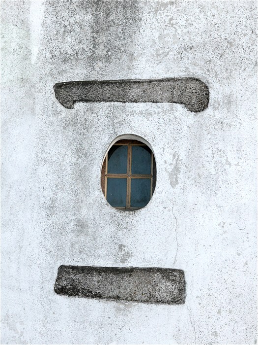 Oval Window with granite sill and beam in Marvao