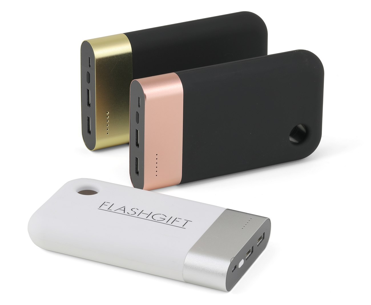 Three large power banks, black and white with metal bands silver, gold and copper colour