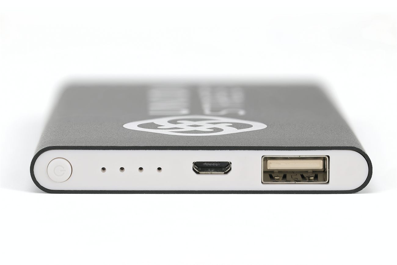 Power bank black end view with USB socket and controls